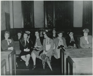 Pictured from left to right in the front is Nina Harrison, Edna Wyard, Maude Mann, Mrs. Bert Hout, Adie Gooch, Hazel Barnett, and Mrs. Allen Hill.In the back row, from left to right, is Mrs. Whanger, Elizabeth Miller, and Maud Jackson.