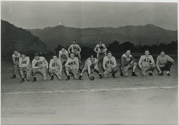 Fall season of 1948 semi-pro football team at Hinton Old Field.Front row, pictured left to right, starting with No. 35 is John Ratliff; "Bud" Maddy (No. 50); "Tobe" Humphreys (No. 31); Jimmy Thompson (No. 49); Tom Clinebell; "Big Deal" Richmond (No. 45); Sweeney (No. 39); Fred Vass (No. 47); "Rob" Vass.Back row, left to right, is Bobby Jack Crush (No. 44); Maynard Bruce (No. 33); Big "Poodie" Phillips; "Flop" Osborne; Julian Fredeging (No. 35); and Charley Johnson.