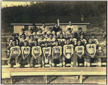 Front row, left to right: (No. 38) Haynes; (No. 43) Joe Hinerman; (No. 40) Raymond Jackson; (No. 32) Bus Tyree; (No. 35) Bill Stone; (No. 39) Ernie Perry; (No. 36) Bobby Dodd; and (No. 44) Charles "Fatty" Harris.Second row, left to right: Ralph Vass; (No. 18) Jimmy Stewart; (No. 19) Bill Crush; (No. 26) Gene Grimmett; (No. 34) Andy Williams; (No. 41) Basil Gil; (No. 42) Paul "Foodie" Phillips; and Morty Meadows.Third row, left to right: Scott Meadows; (no. 10) Jess Parkers; (No. 27) "Rob" Vass; Earl Ailstock; (No. 22) Shelby Allen; (No. 15) Orbe Meadows; and "Buck" Harvey.Fourth row: Coach Johny Worth; Coach Bun Goff; Manager "Noonie" Meadows; and Coach Paul Smith.