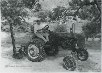 Keatley pictured behind the wheel of the McCormick brand tractor. 