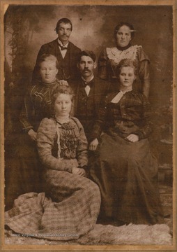 Mr. & Mrs. W. L. Stickler, Haya Erskine, Miss Gwinn (standing), Effie Fox and Ida Fox pictured.Delphia Stickler, Ida Fox and Effie Fox were all sisters.