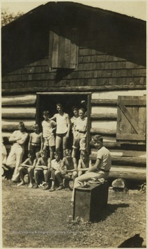 A group of unidentified boys pictured outside their cabin. The camp later became "Camp Summers" in 1985.