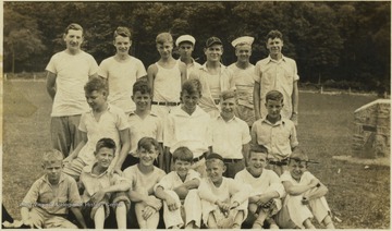 Garrity, pictured top left, with campers. Next to him is Punchy Neely. On the far right is John Herbert Swatts. Bobby Neely pictured on far left of the second row. Bill Neely pictured sitting on the far right. The other campers are unidentified.The camp later became "Camp Summer" in 1985.