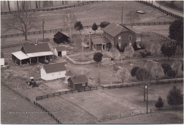Aerial view overlooking the Gwinn home and farm grounds. 