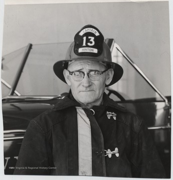Lively pictured in fireman outfit. His hat reads, "Captain."