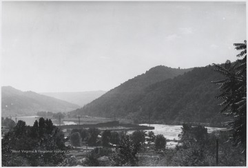 The river and dam construction seen in the distance. 
