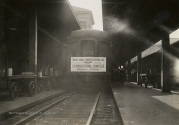 Caption on back of photograph reads: "The sign was placed on our car and remained on from Pittsburgh to St. Louis." 