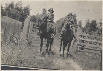 Ethel Wickline pictured on the left riding with an unidentified associate. 