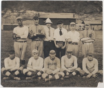 Front row, from left to right, is "Toots" Rogers, Benny Hess, Charlie Lane, and Willey Ailstock.Back row, from left to right, is Buff Collins, Footy Stover, John Fisher, Windy Waid, and Josh Fox.