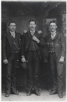 In the center is Oce Bobbitt. To the right is Bill Echols. The man on the left is unidentified. 