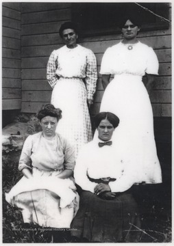 Front row, from left to right, is Edna Powers and Lula Cook. In the back is Mrs. Dunckle and Cynthia Shelton. 