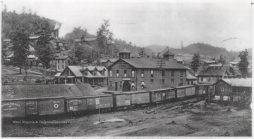 C. & O. cars line along the tracks that run through the coal town.