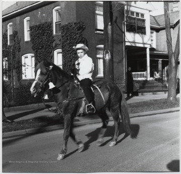 An unidentified boy is pictured riding between Second and First Avenues.