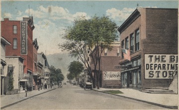 Colored depiction of the street view. Department stores line either side of the road.Published by I. Robbins & Son, Pittsburgh, PA.