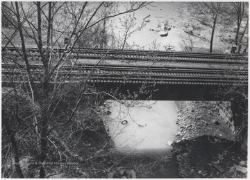The railway bridge hover over a small creek near Sandstone, W. Va.