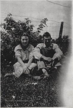 Goff and Linnie Noble Spangler and pictured sitting beside a fence.