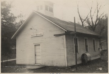 Looking at the entrance of the church building located in Forest Hill District outside of Hinton, W. Va.