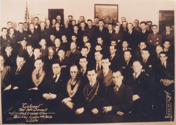 Col. Ted McDowell pictured in the front row between men wearing light collars. 