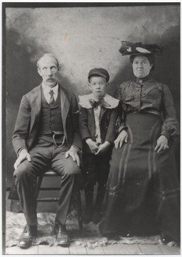 E. C. Grimmett with wife Eliza and son Virgil.