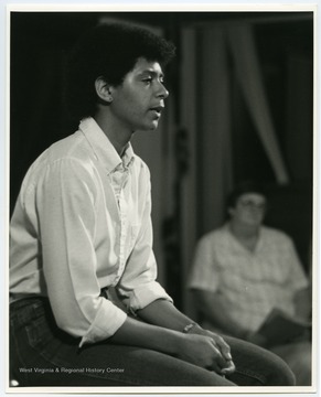 Kathy Jackson was a member of the Governor's Summer Youth Program and an actress in the EcoTheater group.  She played John Henry in a number of performances of the play "John Henry" by Maryat Lee.  She remained involved with EcoTheater for more than eleven years and continued for some time after Maryat Lee's death.Maryat Lee (born Mary Attaway Lee; May 26, 1923 – September 18, 1989) was an American playwright and theatre director who made important contributions to post-World War II avant-garde theatre.  She pioneered street theatre in Harlem, and later founded EcoTheater in West Virginia, a community based theater project.Early in her career, Lee wrote and produced plays in New York City, including the street play “DOPE!”  While in New York she also formed the Soul and Latin Theater (SALT), and wrote plays centered around the lives of the actors in the group.In 1970 Lee moved to West Virginia and formed the community theater group EcoTheater in 1975.  Beginning with local teenagers from the Governor’s Summer Youth Program, the rural theater group grew, and produced plays based on oral histories collected from the local community.  Each performance of an EcoTheater play involved audience participation and discussion.  With the assistance of the Humanities Foundation of West Virginia, guest scholars became a part of EcoTheater.