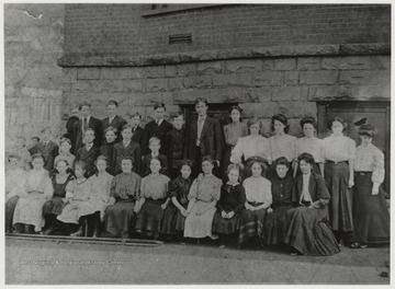 Portraits of the first-ever students and faculty of the high school. Subjects unidentified. 