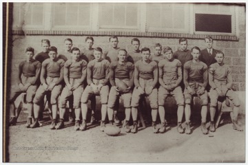 Pictured in the front row, from left to right, is John Osbourne, Frank Maddy, Mayo Ballenge, John Scott, Harry Bragg, Howard Bostic, Alfred Hutchinson, Joe Mann, and Jim Ballengee.In the second row, from left to right, is Burdette Hutchinson, Billy Scott, Eugene  Meadows, Dean Lowry, Robert Hutchinson, Percy Halloran, Junior Taylor, and Coach Roy C. Pollick. 