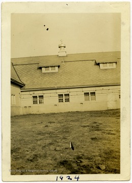 Side view of a plain building, likely a barn, at the WVU Dairy Farm.