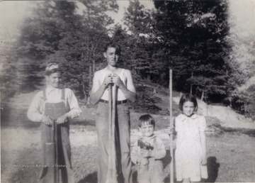 Jim, Bill, Bob and Juanita Sirk, the children of Bernie and Pauline Sirk of Preston County, West Virginia.