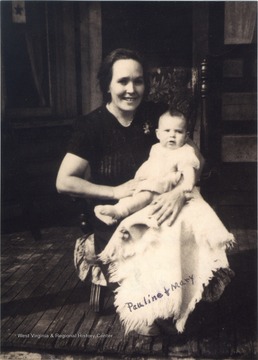 Grandmother of Judy Sirk, Pauline Barr Sirk holding baby daughter, Mary.