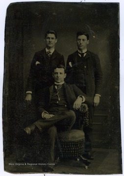 Portrait of Hal Reynold, James Barrick, and Jim [Leks] from a photograph album of late nineteenth century images featuring residents from Keyser, W. Va.