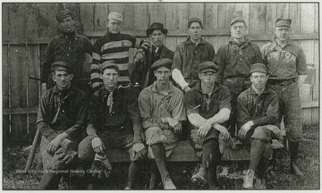 A team portrait of the C. & O. baseball team.In the back from, from left to right, is Ervin Maxwell (center field); Joe McCarthey (pitcher); John Warhop (Wauhop) (pitcher); Ocar Whitlock (1st base); Will Turner (3rd base); and Bob Turner (pitcher).In the front is Arthur Sydnor (left field); Elvin Wise (2nd base); Harry Starbuck (catcher); George Secrest (short stop); and John Hobbs (right field). Warhop (Wauhop) pitched the ball that Babe Ruth hit for his first professional homer run. 