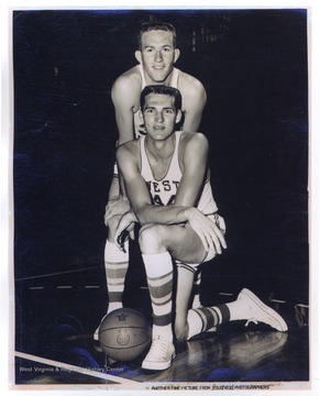 West, No. 44 pictured in the forefront, poses with teammate Willie Akers. 