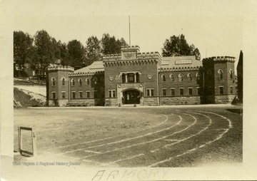 This image is part of the Thompson Family of Canaan Valley Collection. The Thompson family played a large role in the timber industry of Tucker County during the 1800s, and later prospered in the region as farmers, business owners, and prominent members of the Canaan Valley community.View of West Virginia University's Armory building.