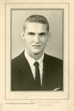 High School Senior Portrait of Jerry West.  West graduated from East Bank High School in 1956 and after a large number of universities showed interest in him, West chose to attend West Virginia University.