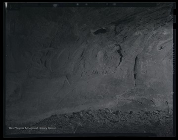Photo of Native American inscriptions inside of a cave. 