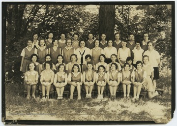 A group of girls pose together for a group photo. Subjects unidentified. 