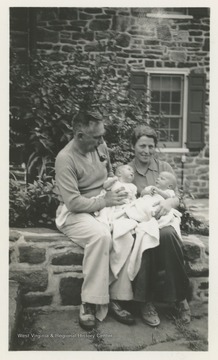 Pearl S. Buck, Richard Walsh, and adopted twin boys, probably at Buck's home in Doylestown, Pa.