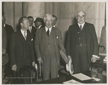 Thomas S. Lamont, John W. Davis, and J.P. Morgan at a Senate banking and currency committee meeting in Washington, D.C. 