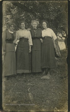 The women are identified as Bessie, Martha, Chassie and Rita. They are family members of the Forbes, Lewis, and Grose (or Groves) families. 
