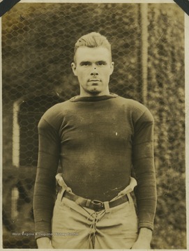 A West Virginia University football player identified as "Henry" is pictured in his practice gear. 