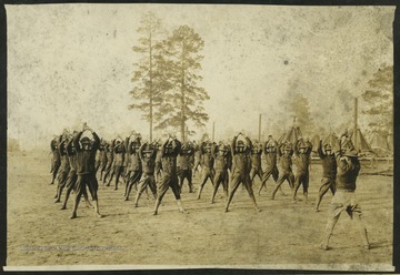 Pre-WWII photograph of the military camp from an album belonging to W. S. Wilkin.The 100th division was headquartered in Wheeling in 1924 and in Charleston in 1937, but was disbanded due to a lack of service in the interwar years. It was reactivated in November 1942 and sent to Marseille, France in October 1944 after extensive combat training. Today, the division serves as a major training command of the United States Army Reserve. 