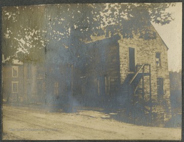 View of the office building that occupied the surveyor's for the Baltimore and Ohio Railroad.This photograph is found in a scrapbook documenting the survey for the B. & O. Railroad in West Virginia and surrounding states. 