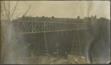 The bridge, which stands 282 feet above water, is located on the Queen and Crescent Route, which connects Cincinnati to New Orleans.This photograph is found in a scrapbook documenting the survey for the Baltimore and Ohio Railroad in West Virginia and surrounding states. 