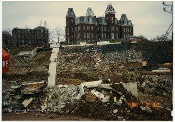 Rubble from Mountaineer Field demolition is visible on the hillside leading up to Woodburn Hall.