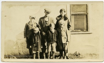 Portrait of the Ferguson family, likely taken in Montana.  Blanche, the mother, was born in West Virginia.Back row Left to Right:George Jr.,  George, and BlancheFront Row Left to Right:Margaret, D. Meigs , and Stewart