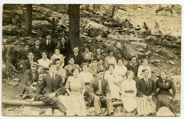 Erma is third from the left in the second row.