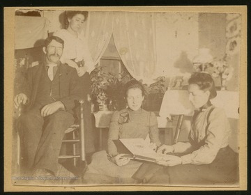 Loretta and Alice Harper (far right) with two unidentified people.