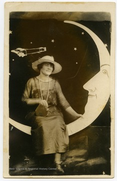 Unidentified woman of the Harper family posing with a moon background.