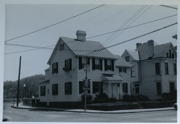 Tennant House. Spruce Street, Morgantown, W. Va. Federal style, ca. 1888. Professor W. T. Willey, original owner.From the thesis of "The Influences of Nineteenth Century Architectural Styles on Morgantown Homes," call number NA7125.P481965.
