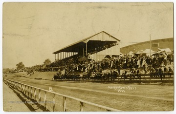 A view of the racetrack and grandstand at the old fairgrounds, located in Star City, during the 1909 Morgantown Fair.